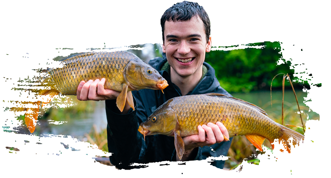 Picture of Carl holding two common carp.
